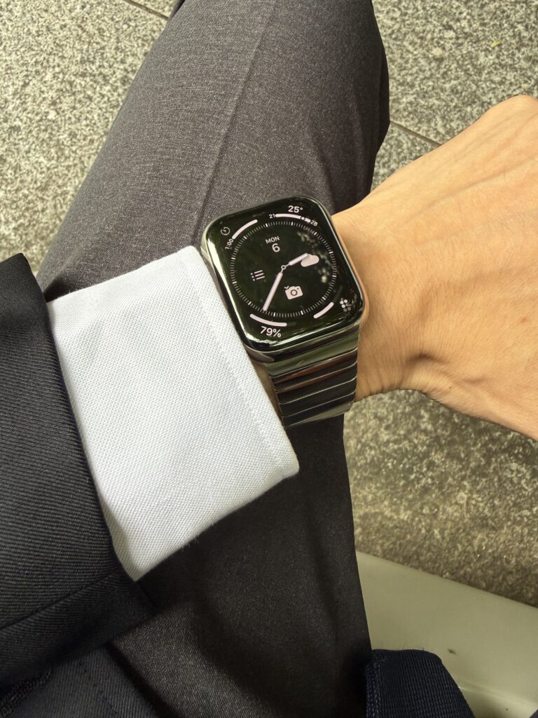 Apple Watch Series 7 Titanium & Link Bracelet works well with a suit