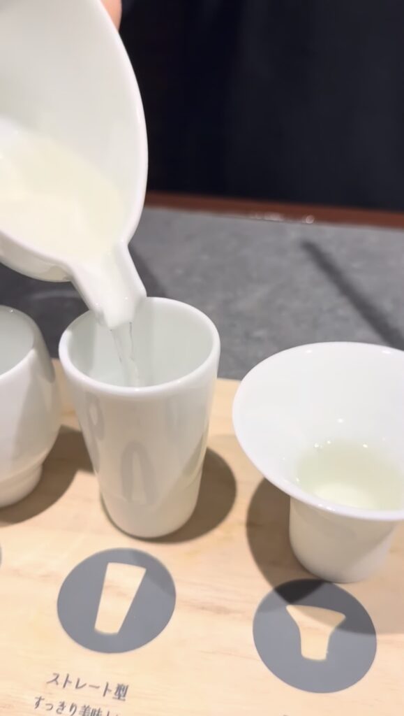 Same sake served in four different Japanese ochoko cups
