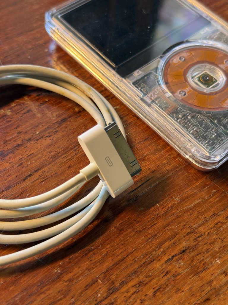 iPod Classic with an Apple 30-pin charging cable