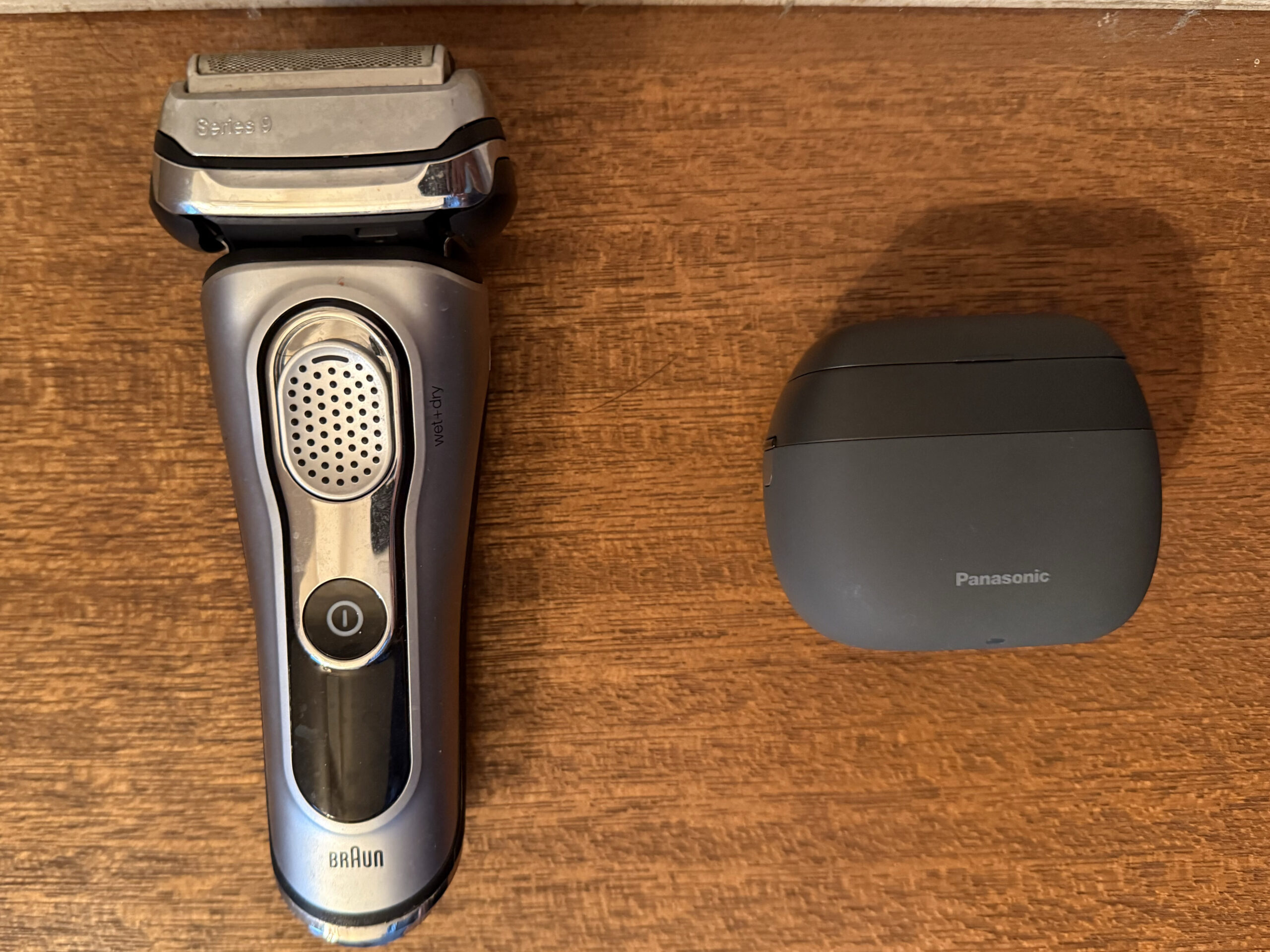 Panasonic LAMDASH PALM IN compared with a standard Braun electric shaver