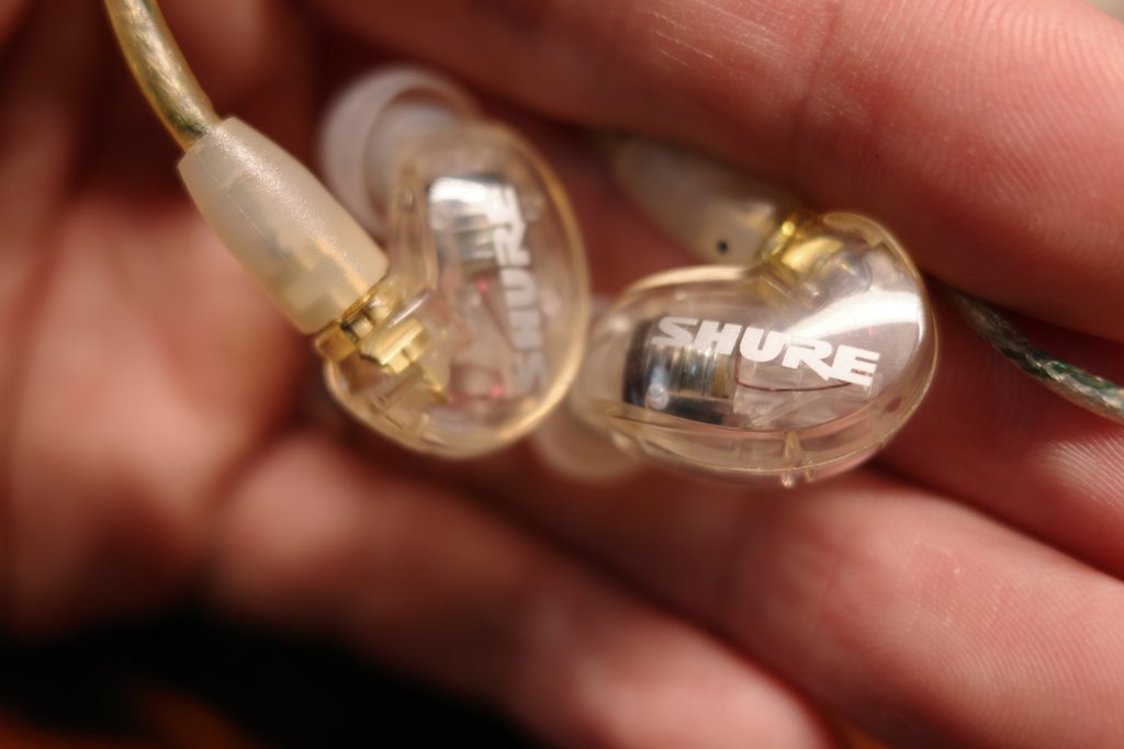 Shure SE215 Clear showing its transparent housing and internal components